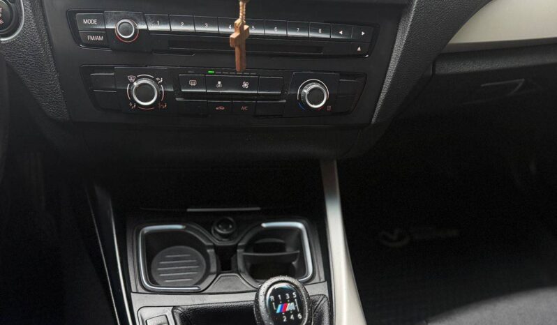BMW 114i 2015 lleno