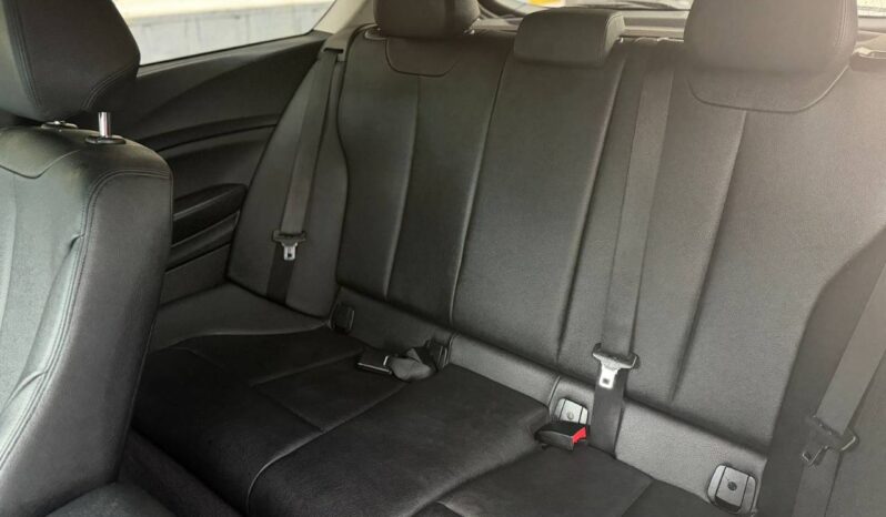 BMW 114i 2015 lleno